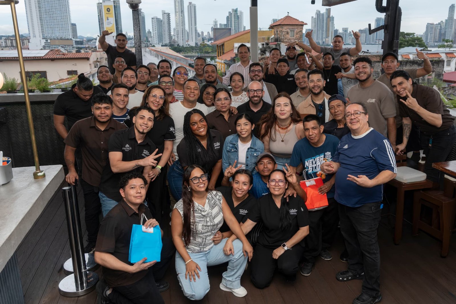 The Tántalo Hotel team gathered on the rooftop terrace